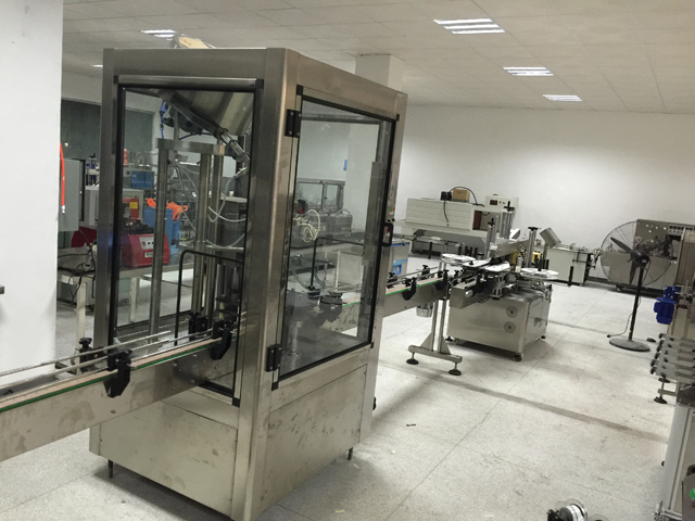 خط تغطية ماكينة الوسم.jpg