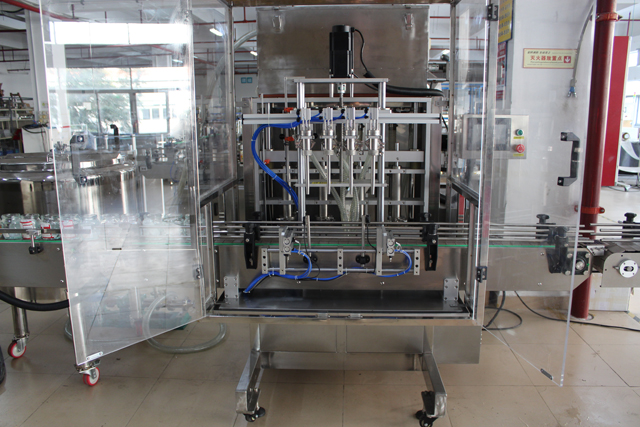 ماكينة تعبئة 4 رؤوس (3).JPG