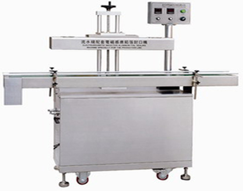 automatic aluminum foil sealing machine آلة ختم رقائق التعريفي.JPG