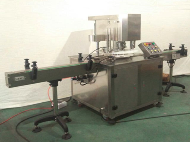 آلة غلق العلب.jpg