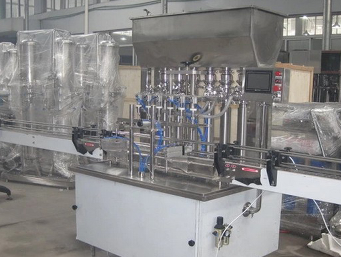 6 filling heads filling machine automatic linear model 6 رؤوس حشو سائل.jpg