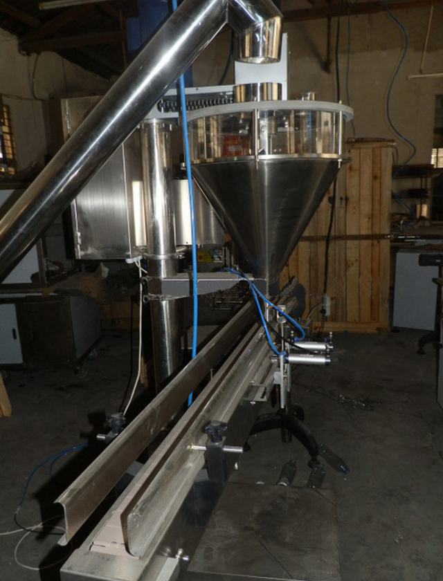 lateral shot for auger filling machine powder مصنع حشو الدقيق.jpg