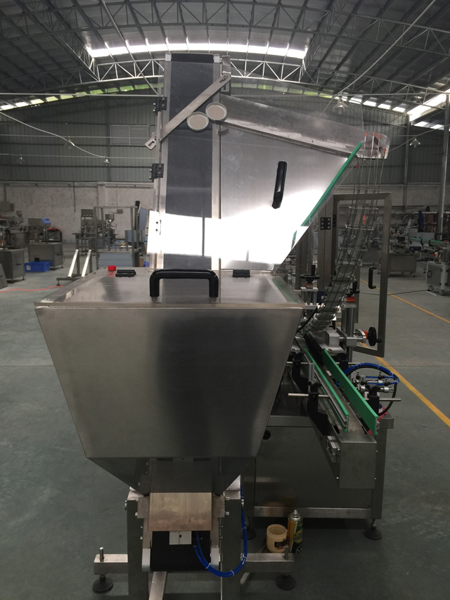 نظام التغذية التلقائية للأغطية.jpg