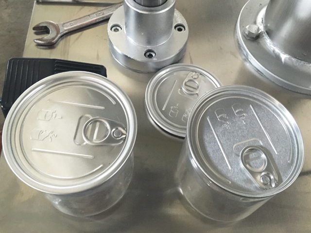 ماكينة تغليف العلب المعدنية.jpg