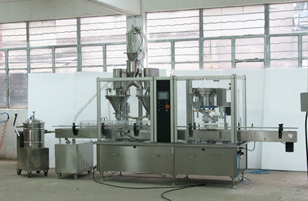 2 heads filling capping machine pharma bottles آلة تعبئة المساحيق ذات الرأسين.jpg