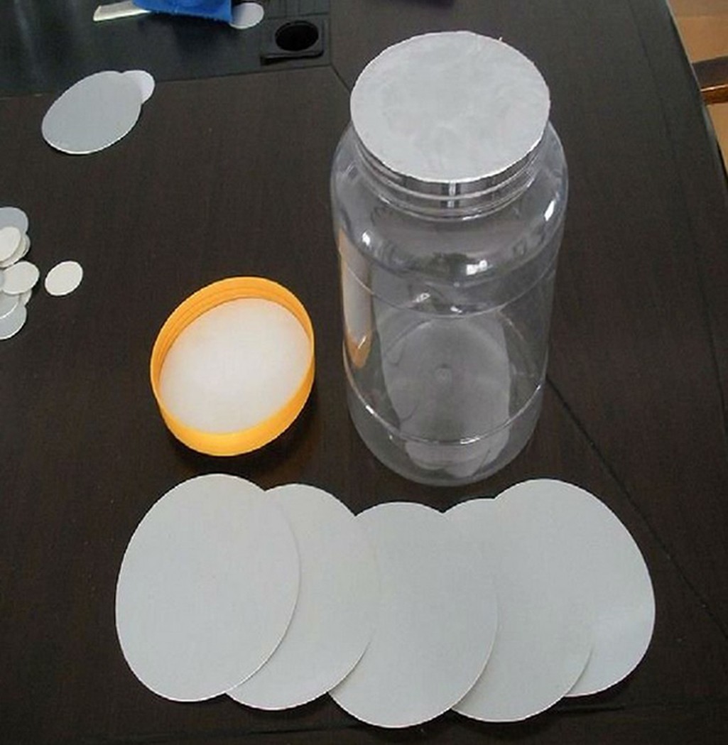 sealing effect for aluminum sealer خط إنتاج السوائل شبه الأوتوماتيكي.jpg