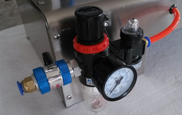 pneumatic liquid lotion filling machine جزء هوائي لآلة التعبئة.jpg