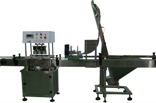 vacuum capping machine غطاء-مفرغ-من-الفراغ-من-الزجاج-الوعاء.jpg