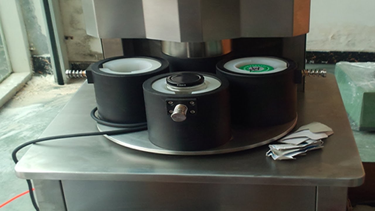 four heads vacuum capping machine semi automatic دليل غطاء الفراغ.jpg